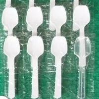 Cuillère en plastique blanche